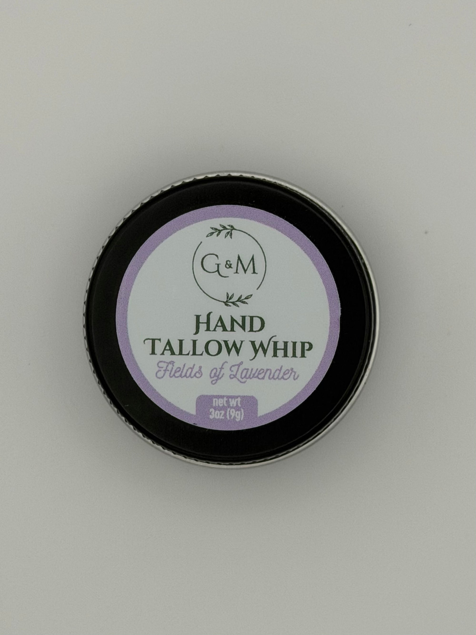 Tin of Hand Tallow Whip with lavender scent on a gray background